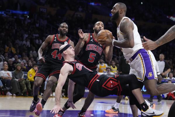 LeBron James returns for season ending push with Lakers AP News